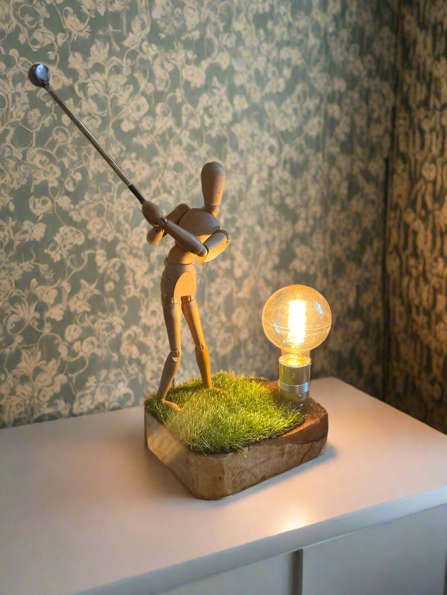 Wooden golfer lamp